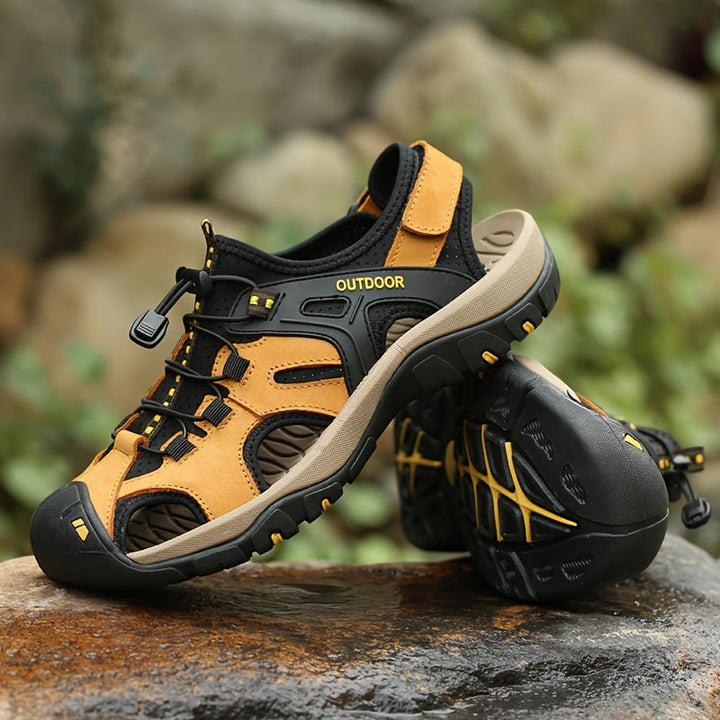 Summer men's hiking sandals, closed-toe for protection. Adjustable fit outdoor footwear with rugged grip.