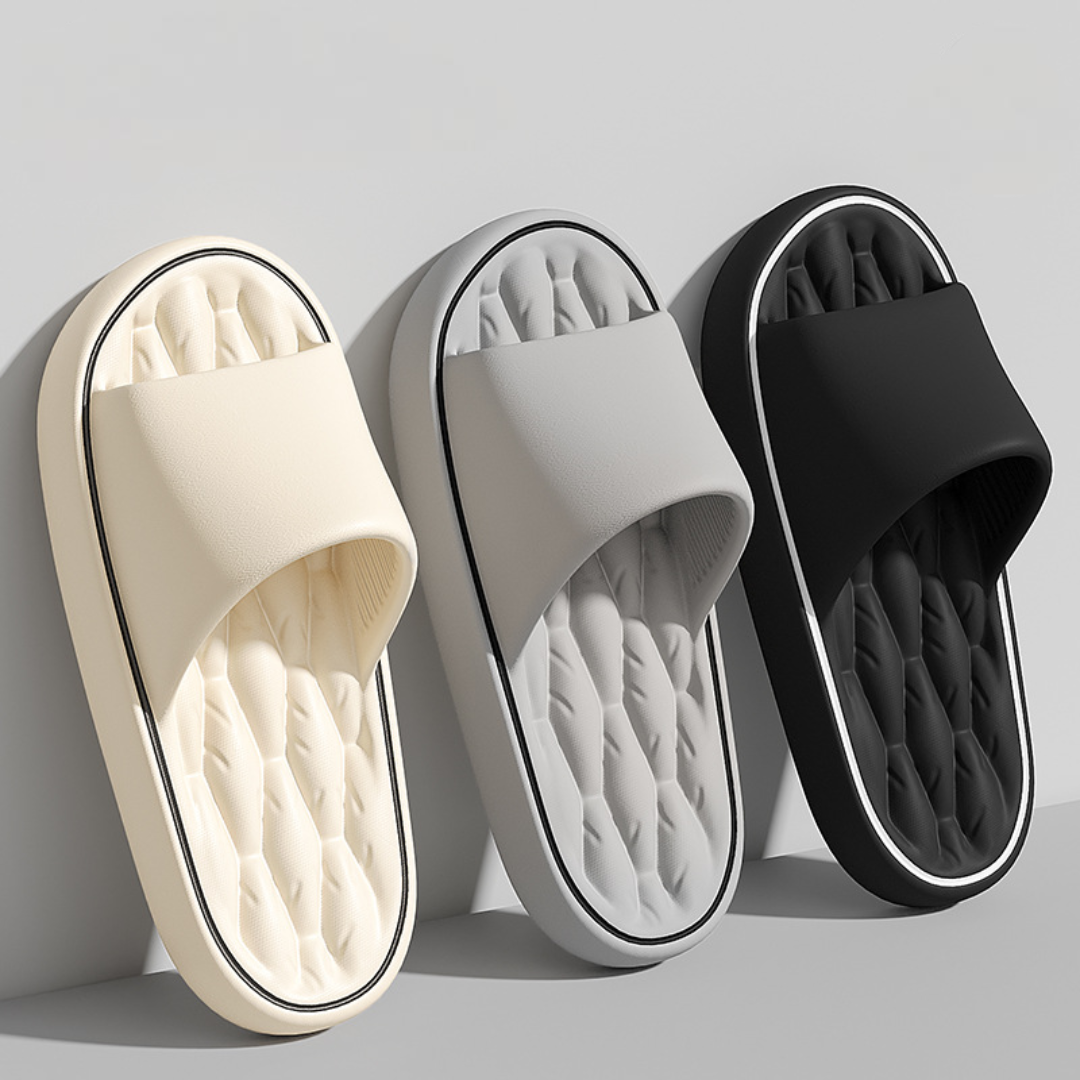 Stylish men's casual pillow slides, ideal summer footwear. Comfortable slip-on shower shoes for poolside and beach.
