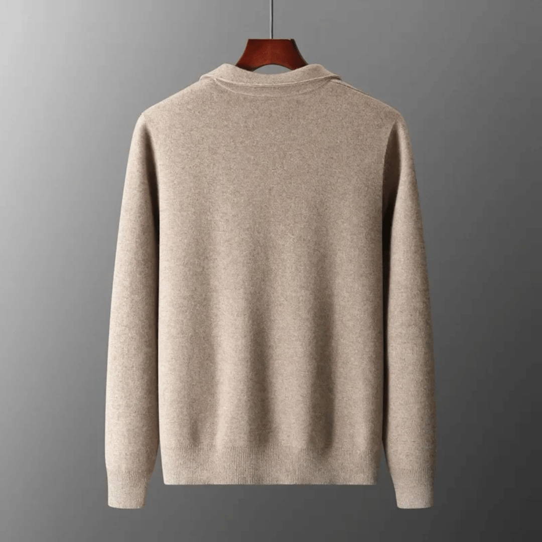Close-up of a men's knit cardigan showing the fabric texture, collared design, and zip-up front.