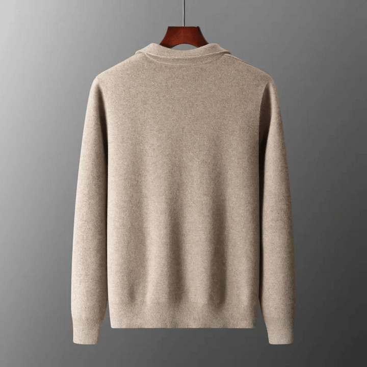 Close-up of a men's knit cardigan showing the fabric texture, collared design, and zip-up front.