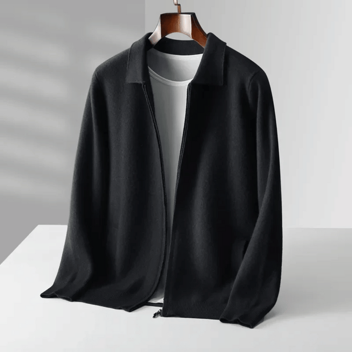 Dark colored men's zip-up knit cardigan with a collar, a smart and comfortable layering piece.