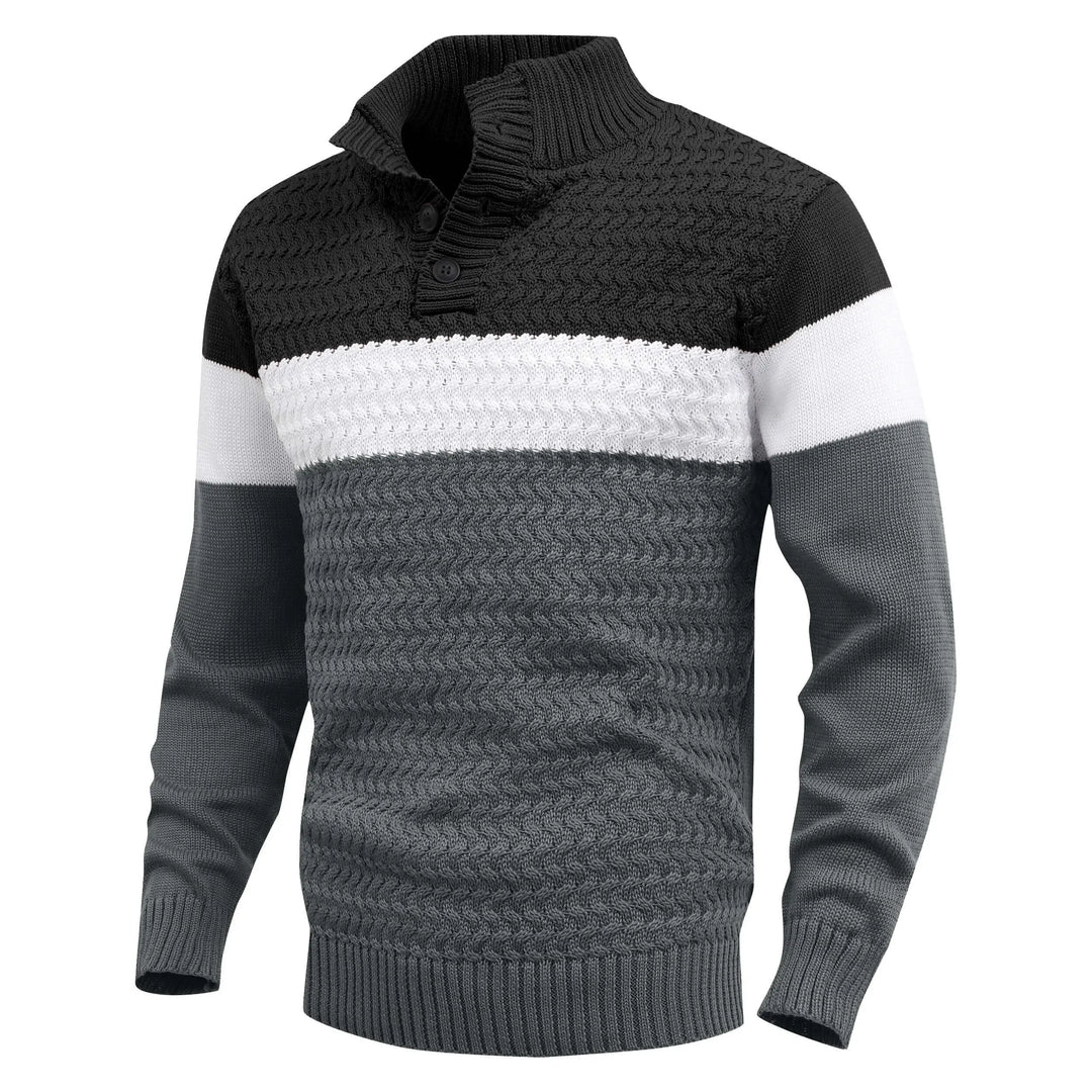 Detailed view of a men's color block knit pullover sweater, highlighting the soft texture & crew neck.