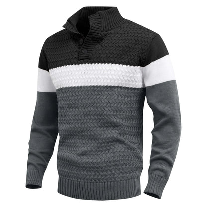 Detailed view of a men's color block knit pullover sweater, highlighting the soft texture & crew neck.