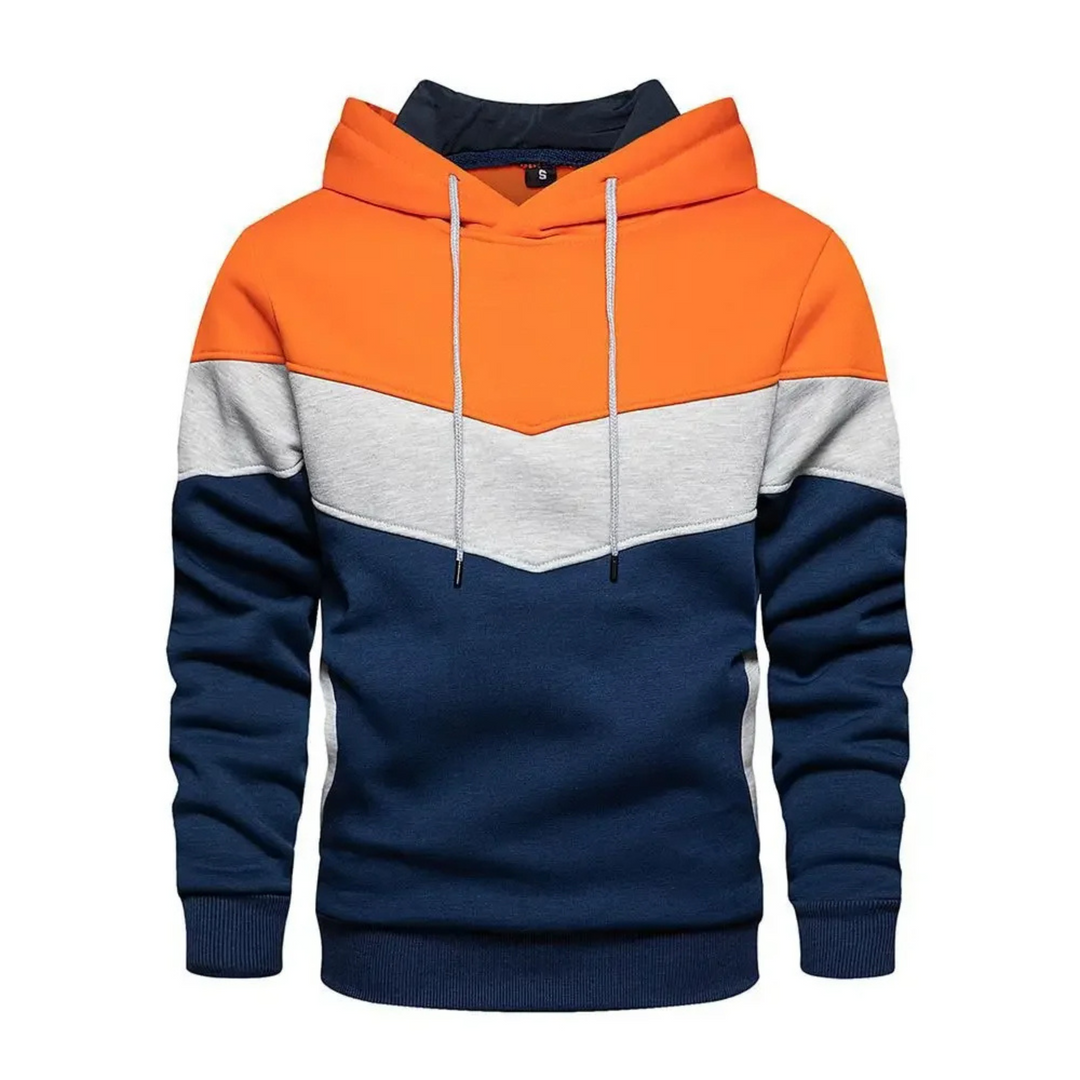 Close-up of men's colorblock athletic hoodie, highlighting fabric texture & dynamic design.