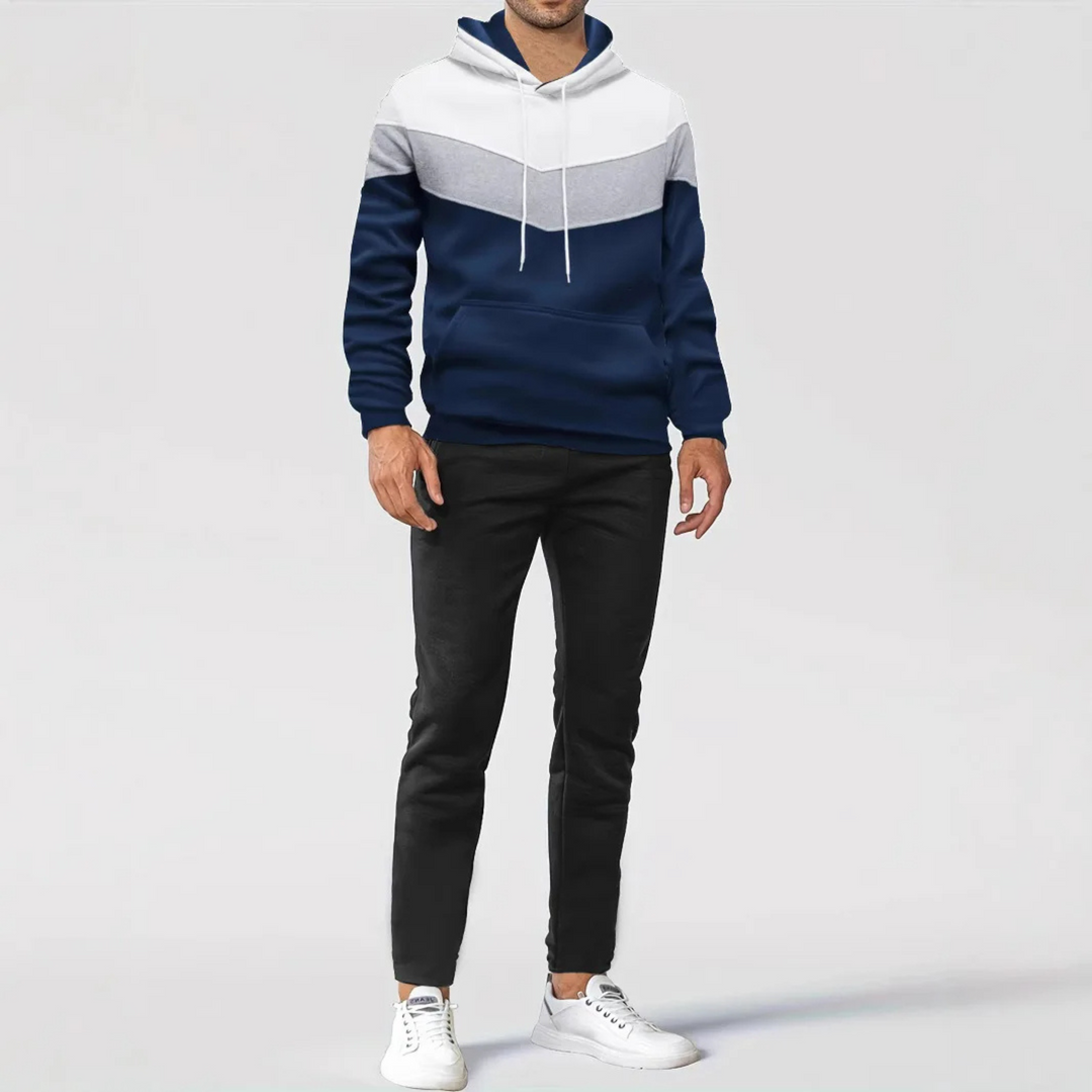 Soft, comfortable men's colorblock athletic hoodie, ideal for a layered urban style.
