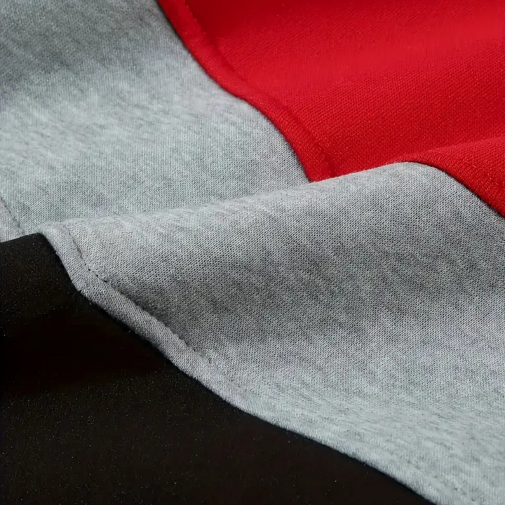Urban style men's colorblock hoodie, a comfortable and dynamic athletic choice.
