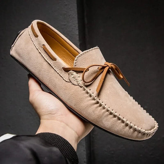 Men's comfortable beige slip-on loafers, perfect for everyday casual style.