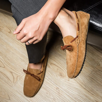 Brown men's comfortable slip-on loafers, great for casual everyday wear and spring.