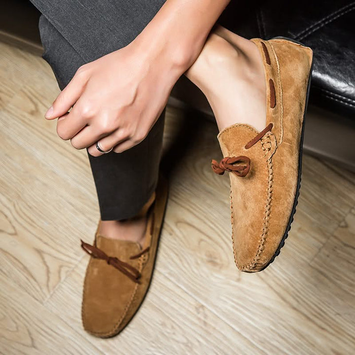 Brown men's comfortable slip-on loafers, great for casual everyday wear and spring.