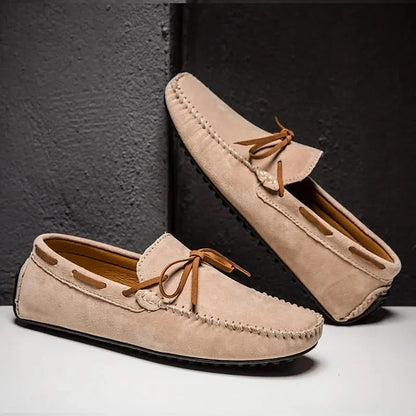 Classic black men's slip-on loafers, versatile for dress casual & everyday wear.