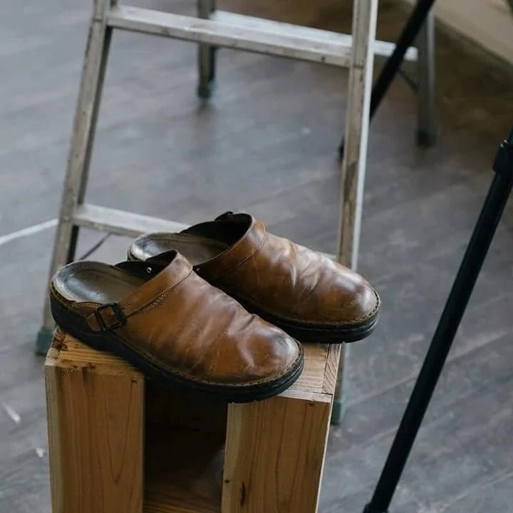 Durable men's casual mules, slip-on design with an integrated heel strap for easy, secure wear.