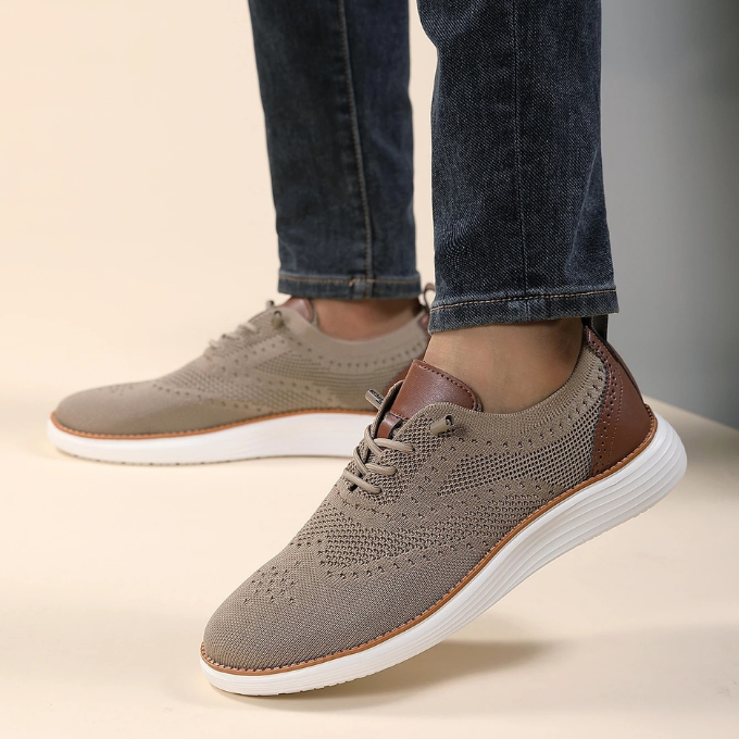 Classic brogue men's dress sneakers, lightweight design for ultimate comfort.