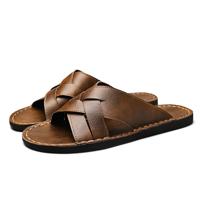 Comfortable men's flat sole cross-strap sandals, ideal summer footwear for beach, walking, and casual activities.