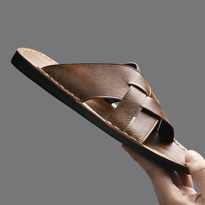 Comfortable men's open-toe cross-strap sandals with a durable flat sole for summer.