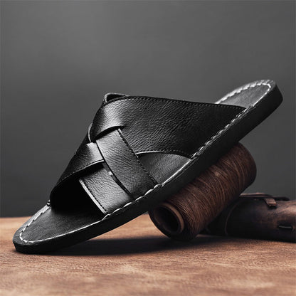 Versatile men's comfortable cross-strap flat sandals, great for beach, walking, or casual summer.