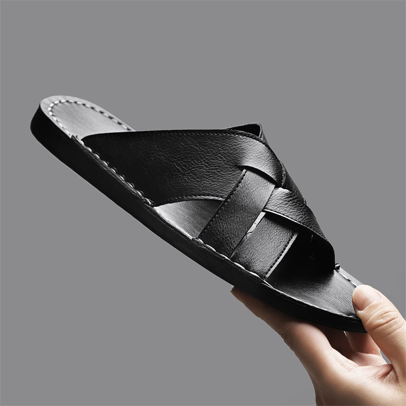 Front view of black men's slip-on cross-strap flat sandals, ideal for summer casual and beach days.
