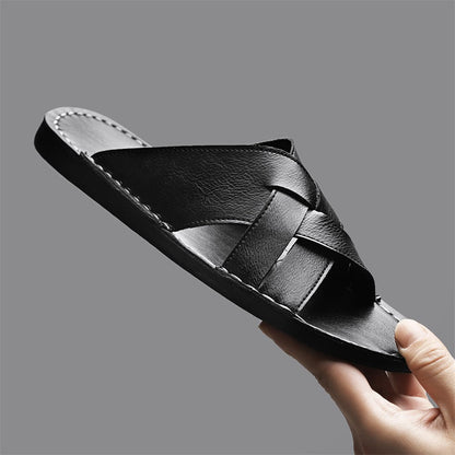Front view of black men's slip-on cross-strap flat sandals, ideal for summer casual and beach days.