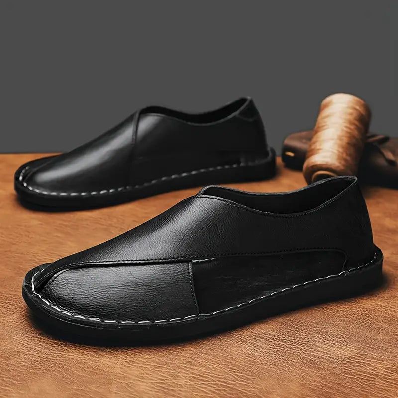 Stylish men's summer sandals with robust cross-strap design for optimal comfort.