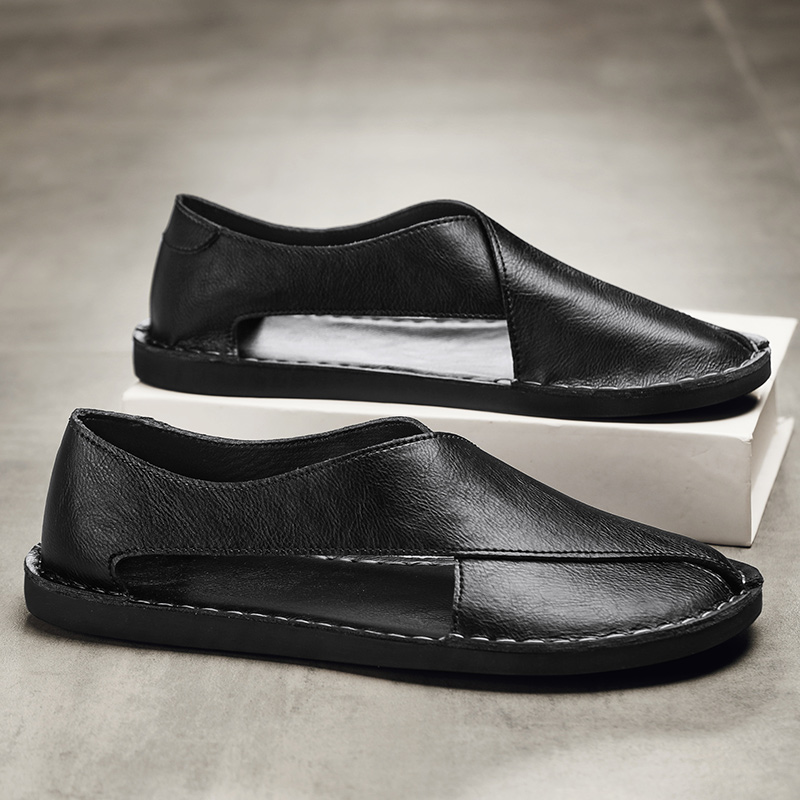 Men's open-toe sandals, featuring secure cross-strap and flat sole for comfort.