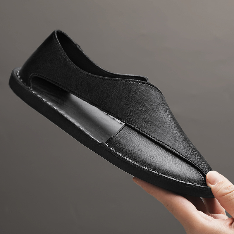 Textured view of men's comfortable cross-strap walking sandals, a summer essential.