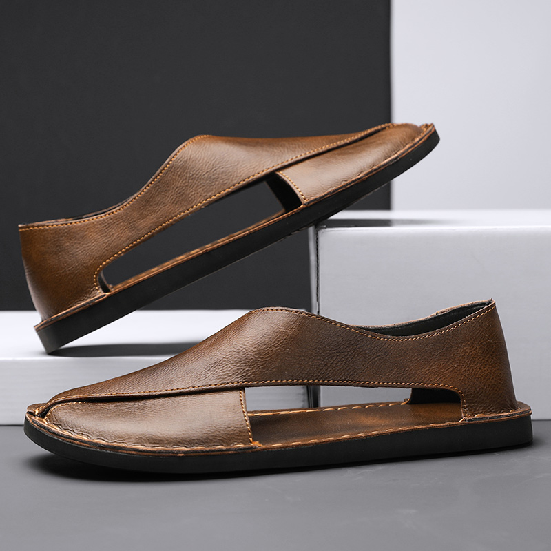 Side profile of men's casual footwear, featuring durable cross-strap design.