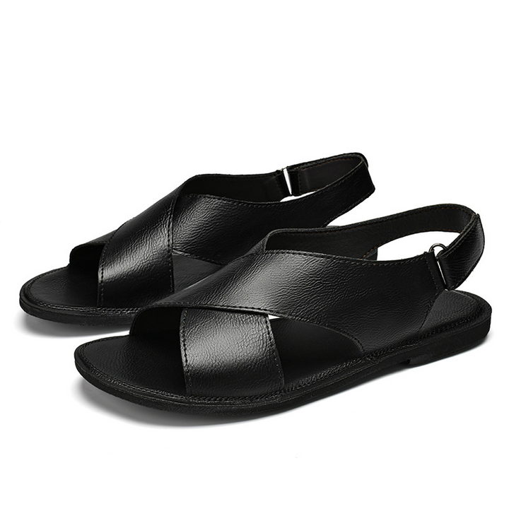 Durable men's flat-sole cross-wrap slip-on sandals for comfortable summer casual & beach wear.