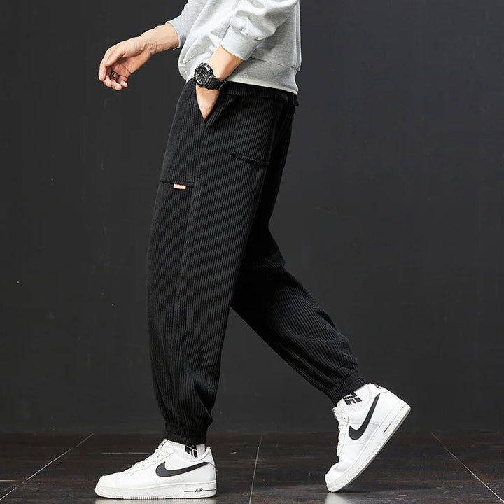 Versatile men's jogger pants for everyday wear, featuring a relaxed fit & athletic style. Ideal for active or casual use.