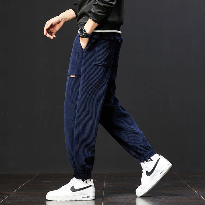 Fade-resistant men's jogger pants with a ribbed texture. Comfortable, relaxed fit for everyday casual & lounge wear.