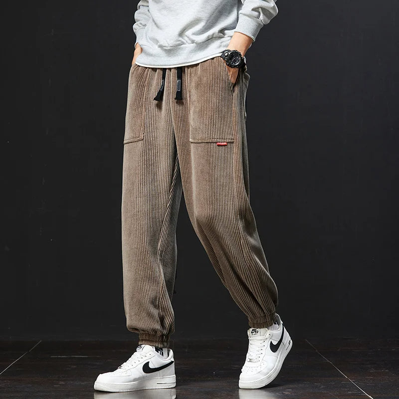 Adjustable men's comfortable jogger pants, ideal for everyday wear. Relaxed fit design with an elastic waist for comfort.