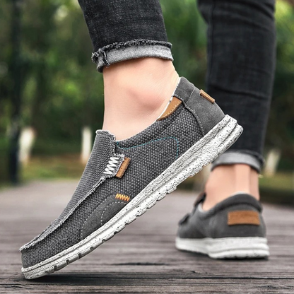 Effortless men's khaki canvas slip-on shoes, providing superior comfort and casual style for daily wear.