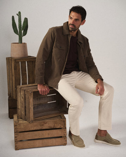 Effortless blue men's canvas slip-on shoes, perfect for easy everyday comfort and casual style.