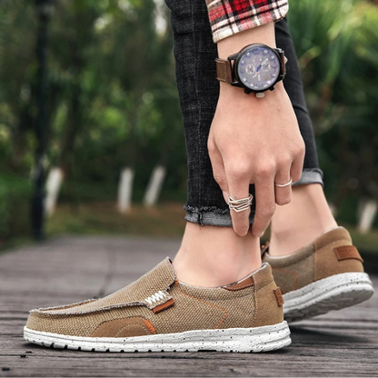 Comfortable men's canvas slip-on shoes with a flexible rubber sole, perfect for versatile everyday wear.