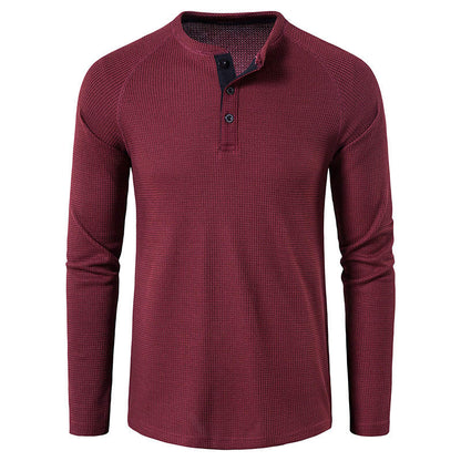 Comfortable long sleeve men's knit henley top, a staple for men's casual fashion.