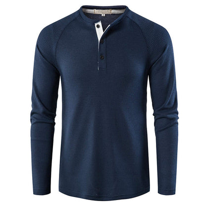 Man modeling comfortable men's long sleeve knit henley shirt, ideal for daily wear.