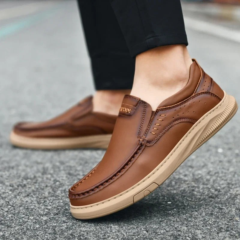 Durable sole men's comfortable leather slip-on loafers, great for work or casual comfort.