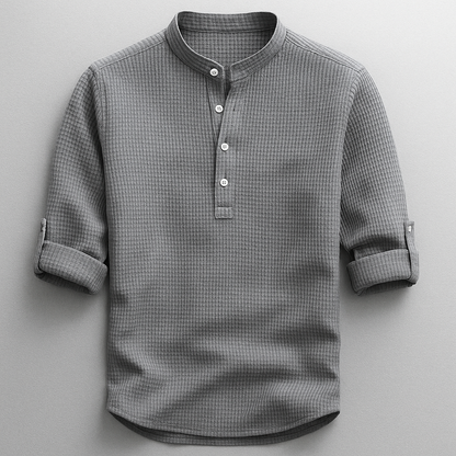 Versatile men's smart casual Henley shirt with buttons, a modern fit ideal for layering or solo wear.