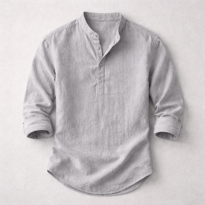 Closeup of a comfortable men's long sleeve henley shirt, showing button-up placket detail & fabric texture.