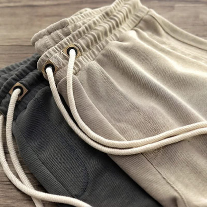 Black men's gym shorts with drawstring, perfect for intense workouts. Comfortable athletic casual shorts for activewear.