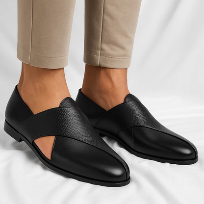 Man wearing comfortable slip-on loafers, ideal for all-day casual wear & versatile style. Elegant footwear.