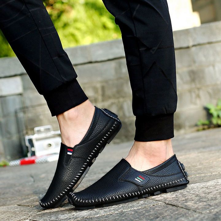 Lightweight men's travel loafers, easy slip-on design for comfortable journeys & smart casual style.