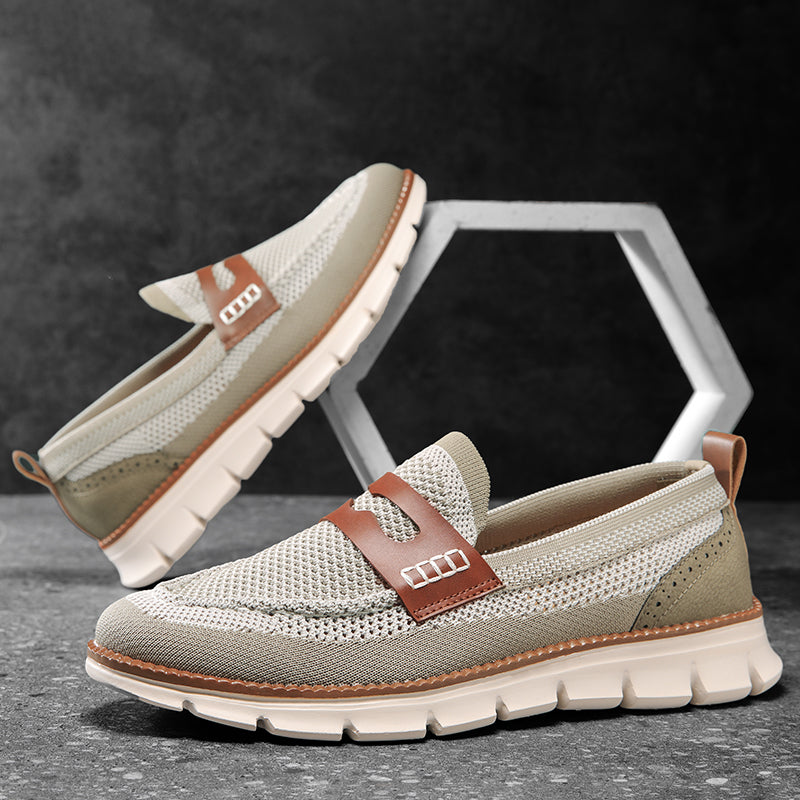 Black men's slip-on loafers, comfortable and stylish for easy everyday wear.