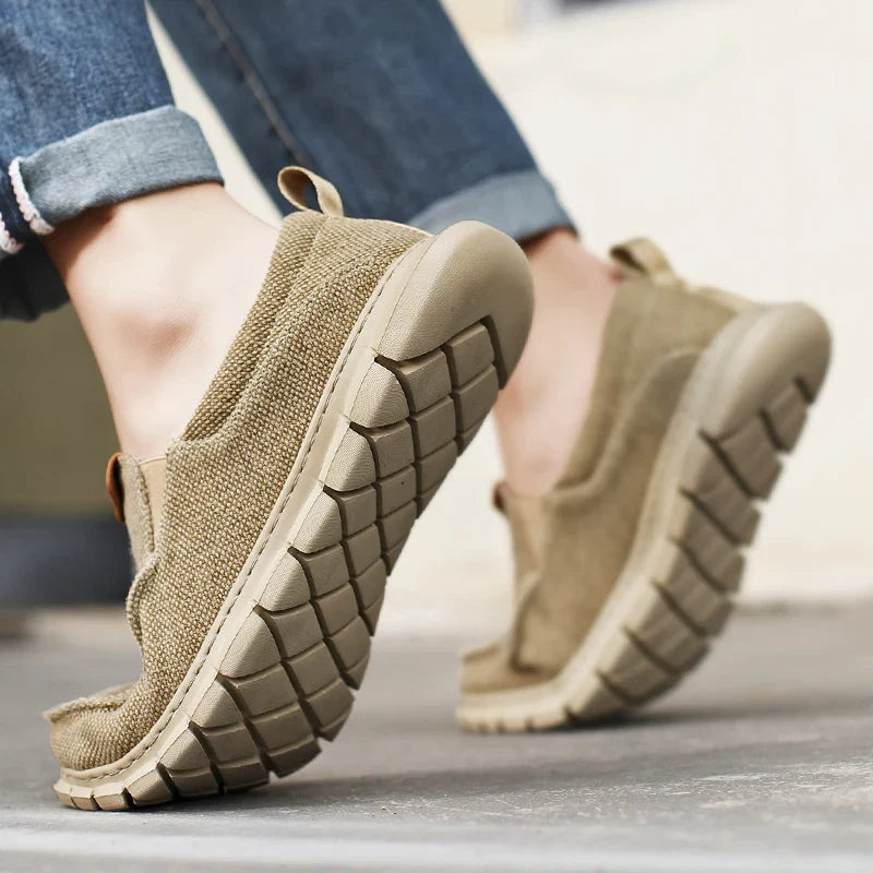 Stylish men's slip-on casual shoes. Comfortable, lightweight footwear for everyday wear, ideal for walking.