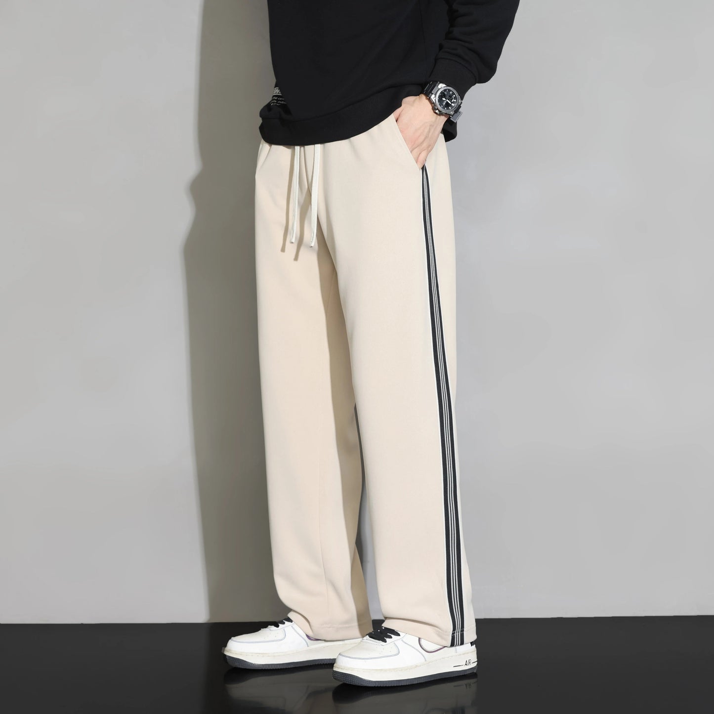 Comfortable men's striped joggers for activewear & leisure. Ideal pants for athletic or casual wear.