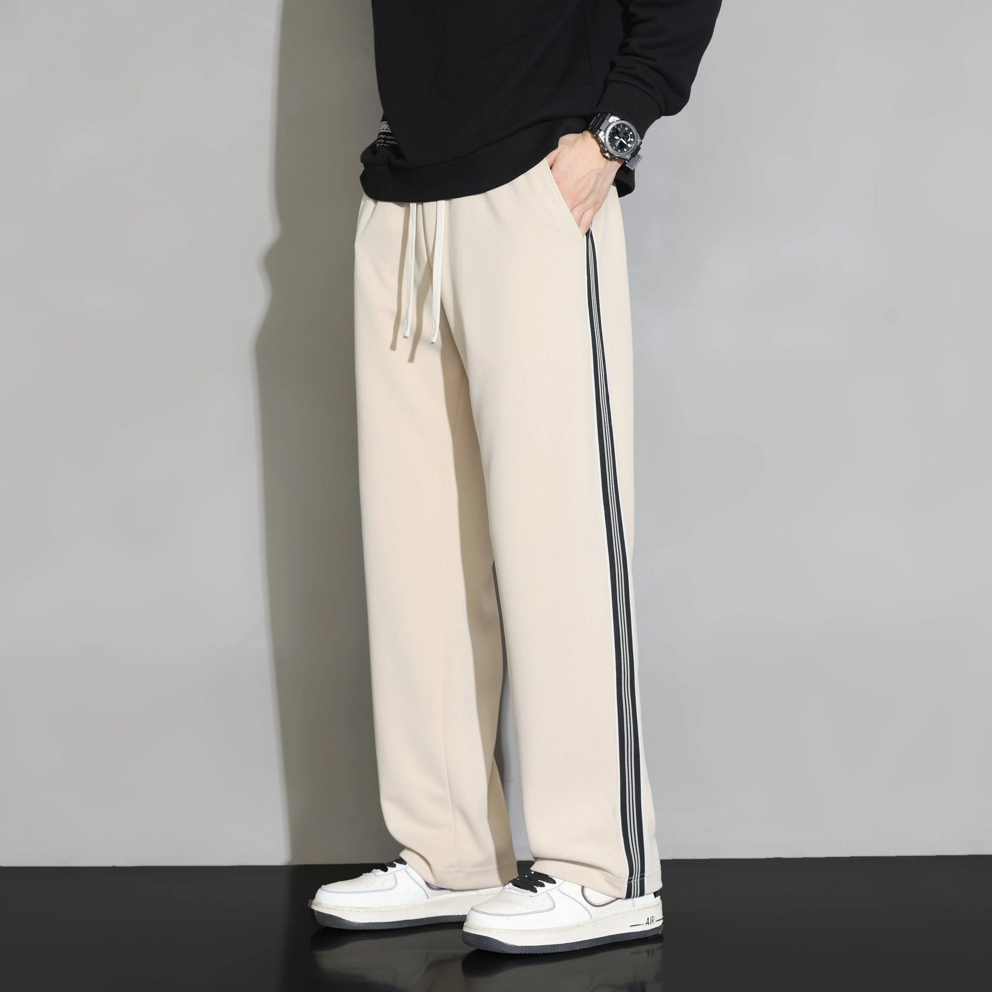 Comfortable men's striped joggers for activewear & leisure. Ideal pants for athletic or casual wear.
