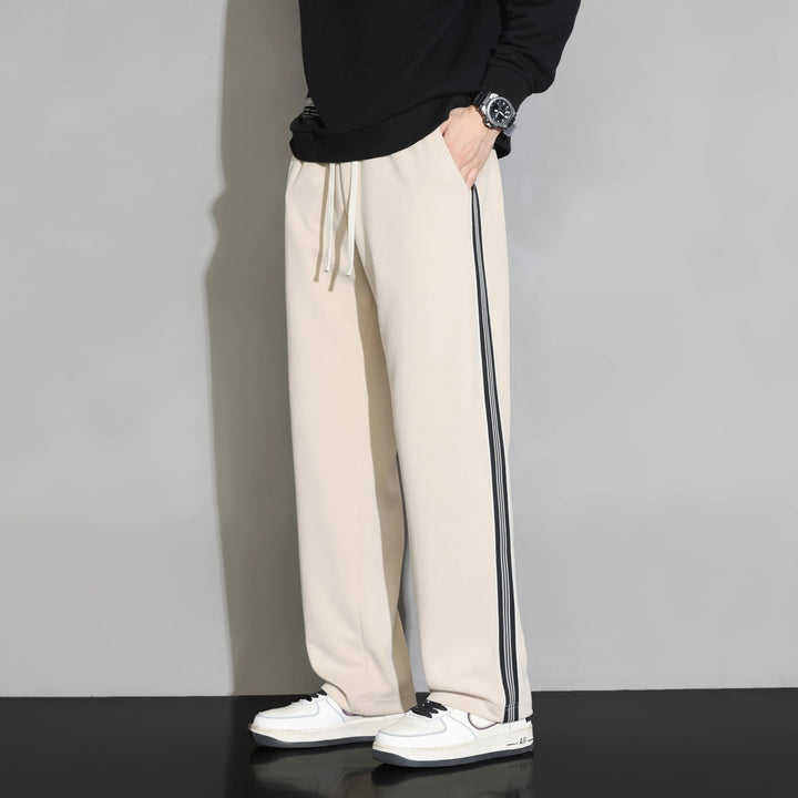 Comfortable men's striped joggers for activewear & leisure. Ideal pants for athletic or casual wear.