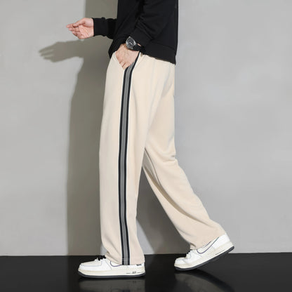 Stylish striped men's joggers. Versatile activewear pants offering comfort for casual & athletic activities.