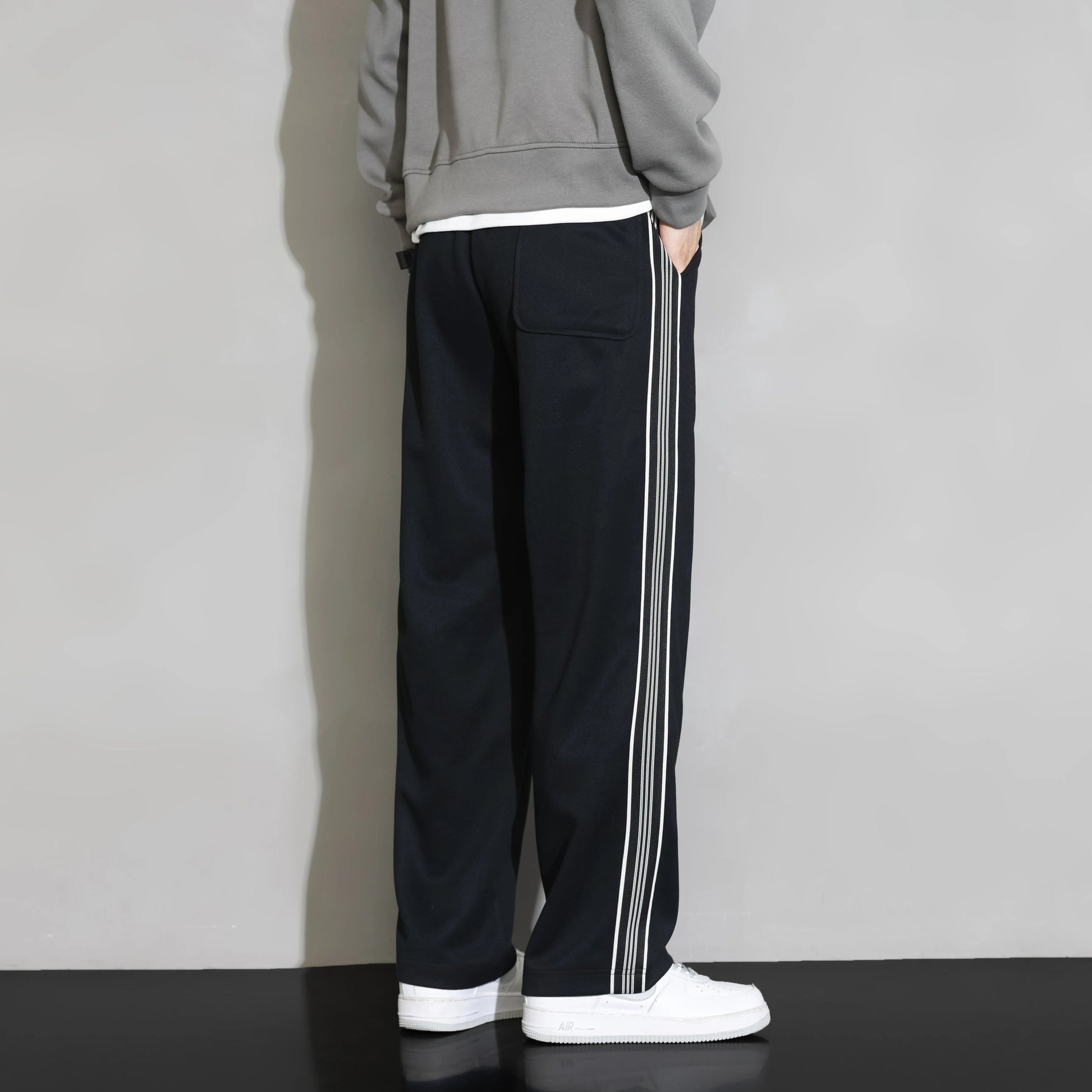 Modern striped men's joggers. Comfortable, stylish pants perfect for activewear, loungewear, or daily casual wear.