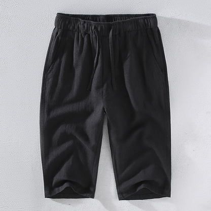Men's casual beach shorts with adjustable drawstring, great for vacation and warm weather essentials.