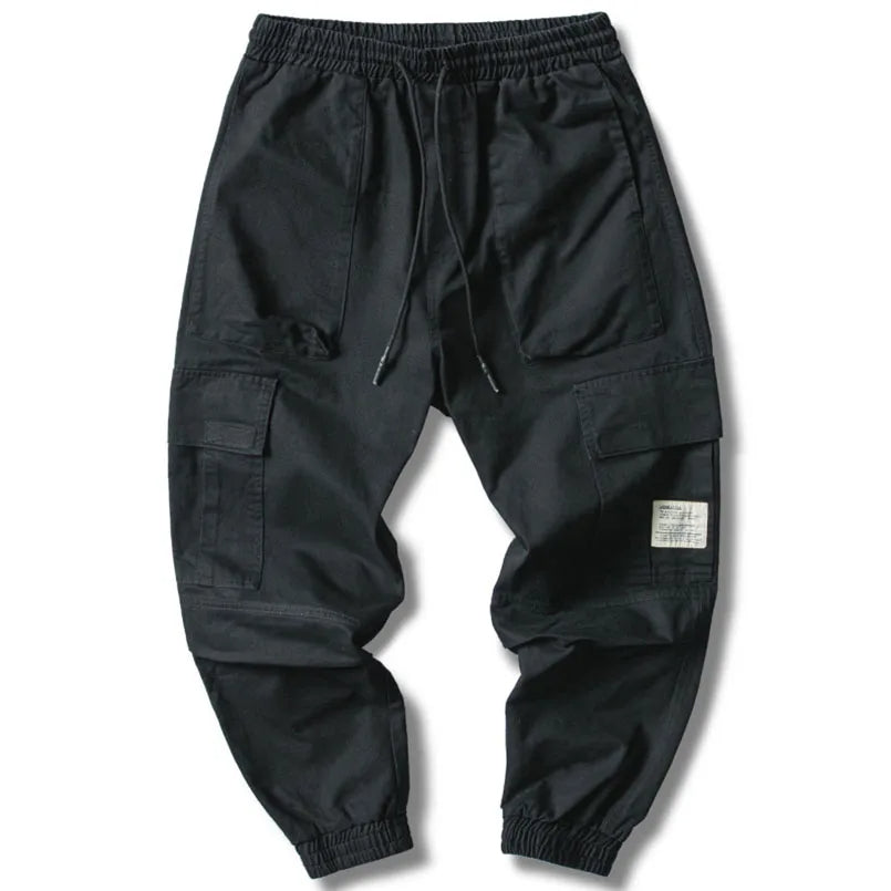 Versatile men's tapered joggers, comfortable for athletic activities, casual outings, or relaxing loungewear. Cotton blend.