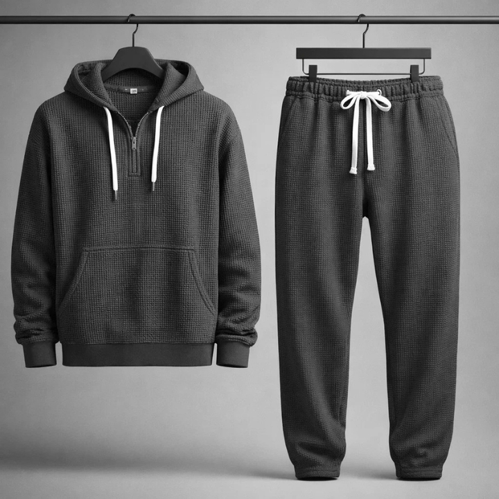 Display of a versatile men's textured comfort clothing set, featuring a hoodie & track suit joggers.